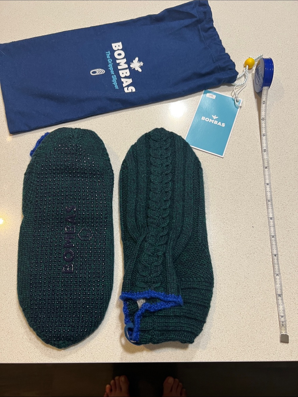Bombas Gripper Slippers.  Forest Green, blue trim.   Size Large. NWT
